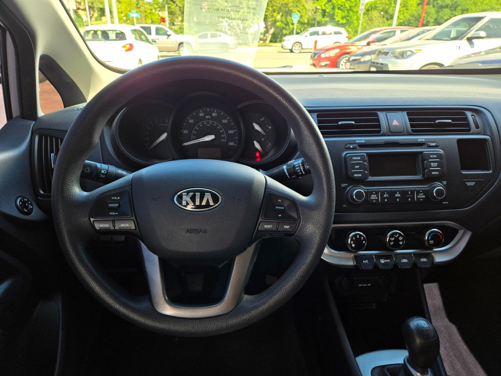 2014 Kia Rio (KNADM4A30E6) with an 1.6L I4 F DOHC 16V engine, Manual Transmission transmission, located at 503 West Court, Seguin, TX, 78155, (830) 379-3373, 29.568621, -97.969803 - Photo #5